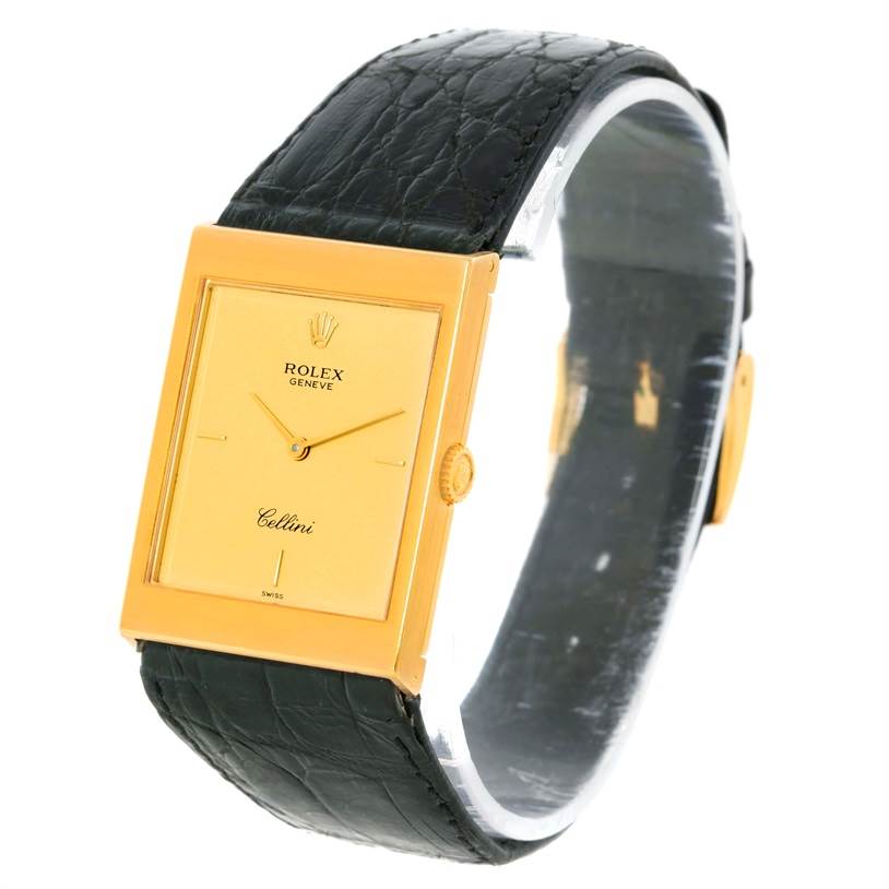 The image shows the front and side of a Rolex Cellini 5071 Men's Yellow Gold Champagne Dial 5071 Men's Yellow Gold Champagne Dial watch, featuring a rectangular gold case and a black leather strap.