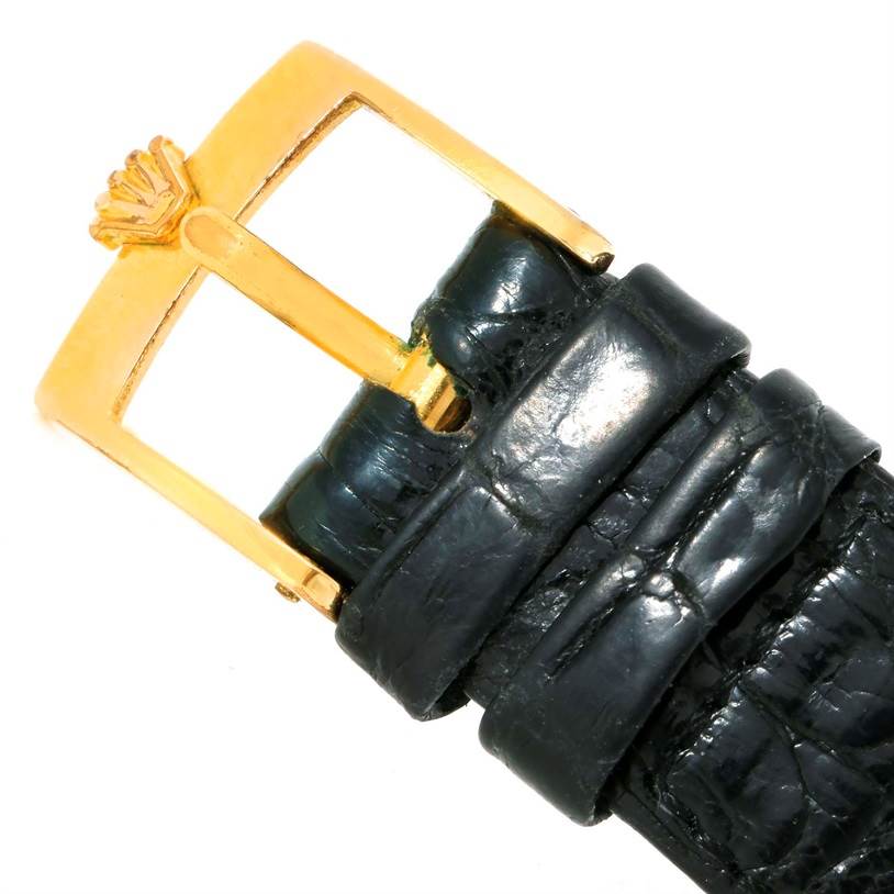 This image shows the buckle and part of the leather strap of a Rolex Cellini 5071 Men's Yellow Gold Champagne Dial 5071 Men's Yellow Gold Champagne Dial watch.