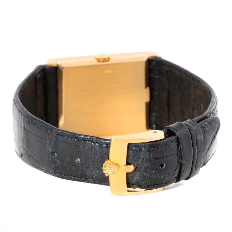 The image shows the back of the gold case and black leather strap of a Rolex Cellini 5071 Men's Yellow Gold Champagne Dial 5071 Men's Yellow Gold Champagne Dial watch, highlighting the clasp and buckle.