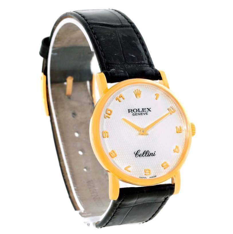 The image shows a Rolex Cellini 5115 Men
s Yellow Gold Mother of Pearl Dial 5115 Men
s Yellow Gold Mother of Pearl Dial watch from a front angle, highlighting the dial, case, hands, and black leather strap.
