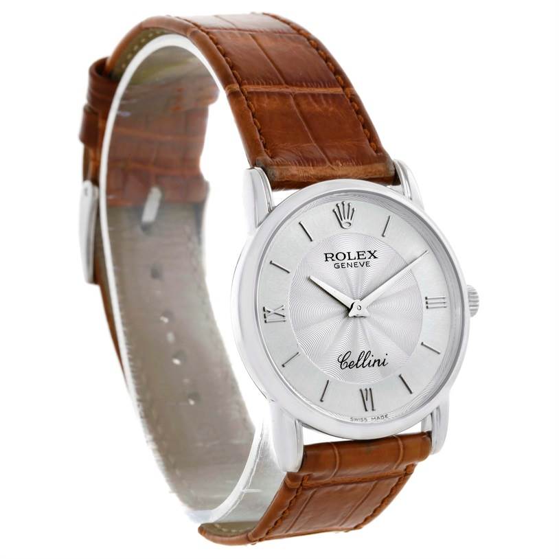 This image shows a Rolex Cellini 5116 Men's White Gold Silver Dial 5116 Men's White Gold Silver Dial watch from an angled side view, displaying its dial, crown, and leather strap.
