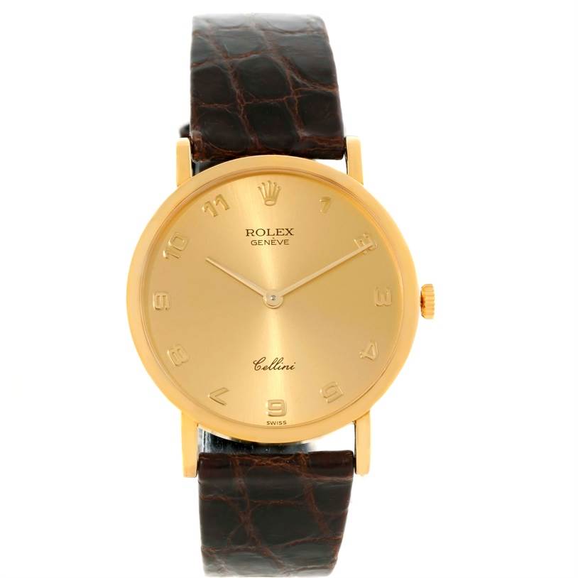 The image shows a front view of a Rolex Cellini 5112 Men
s Yellow Gold Champagne Dial 5112 Men
s Yellow Gold Champagne Dial watch, highlighting its dial, case, and leather strap.