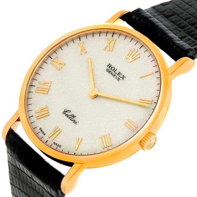 The image shows a close-up of the Rolex Cellini 5112 Men's Yellow Gold Beige Dial 5112 Men's Yellow Gold Beige Dial watch face at an angle, highlighting its dial, hands, crown, and part of the strap.