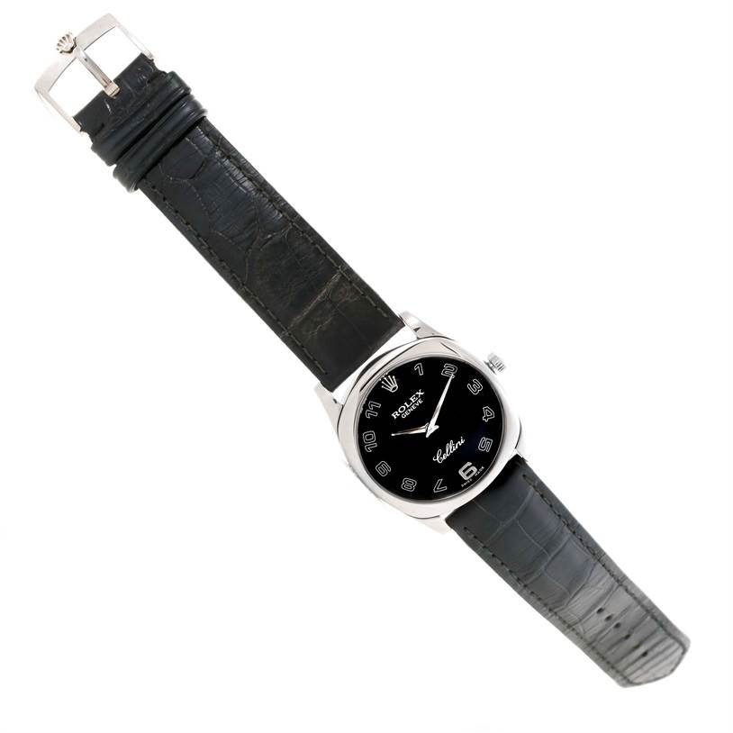 This Rolex Cellini 4233 Men's White Gold Black Dial 4233 Men's White Gold Black Dial watch is shown from a top-down angle, displaying the face, strap, buckle, and crown.