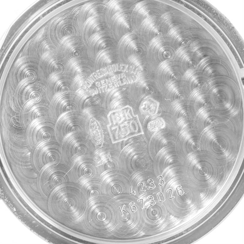 This image shows the inner case back of a Rolex Cellini 4233 Men's White Gold Black Dial 4233 Men's White Gold Black Dial watch, showcasing the engravings and hallmarks.