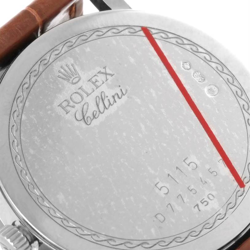 The image shows the back case of a Rolex Cellini 5115 Men's White Gold Silver Dial 5115 Men's White Gold Silver Dial watch at an angle, highlighting the engraved details and strap attachment.