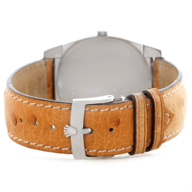 The image shows the back view of a Rolex Cellini 5330 Men's White Gold White Dial 5330 Men's White Gold White Dial watch, highlighting the leather strap and metal buckle.