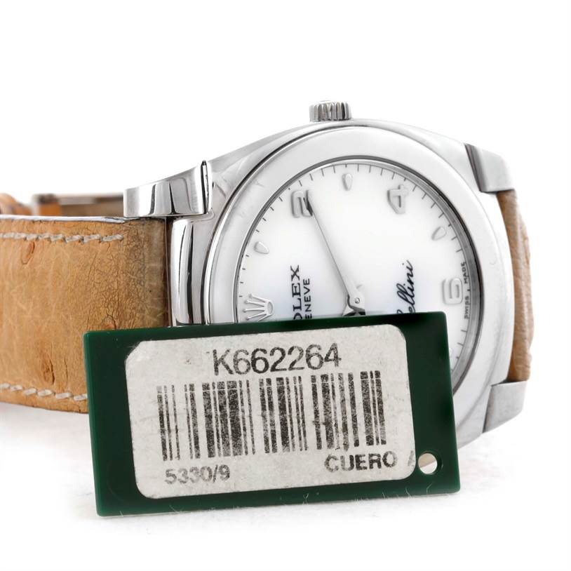 The Rolex Cellini 5330 Men's White Gold White Dial 5330 Men's White Gold White Dial watch is shown from a close-up side angle, displaying the watch face, part of the leather strap, and the crown.