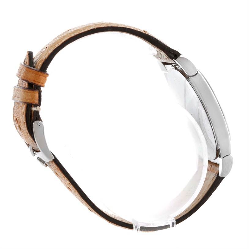 The Rolex Cellini 5330 Men's White Gold White Dial 5330 Men's White Gold White Dial watch is shown from a side angle, highlighting the case and leather strap.