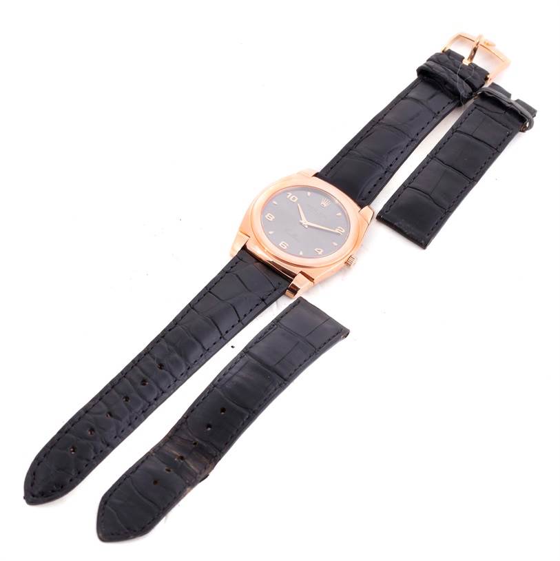 The image shows a Rolex Cellini 5330 Men's Rose Gold Grey Dial 5330 Men's Rose Gold Grey Dial watch displayed flat, with its black leather straps unattached and placed adjacent.