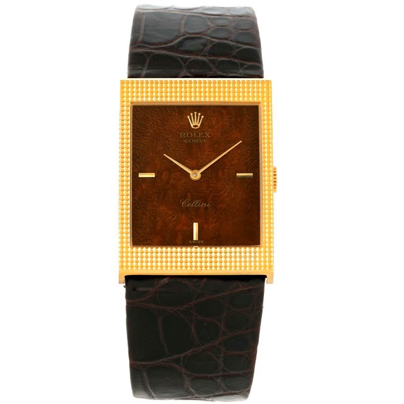 The image shows a front view of a Rolex Cellini 4127 Men's Yellow Gold Brown Dial 4127 Men's Yellow Gold Brown Dial watch, highlighting its gold square case, brown dial, and black leather strap.