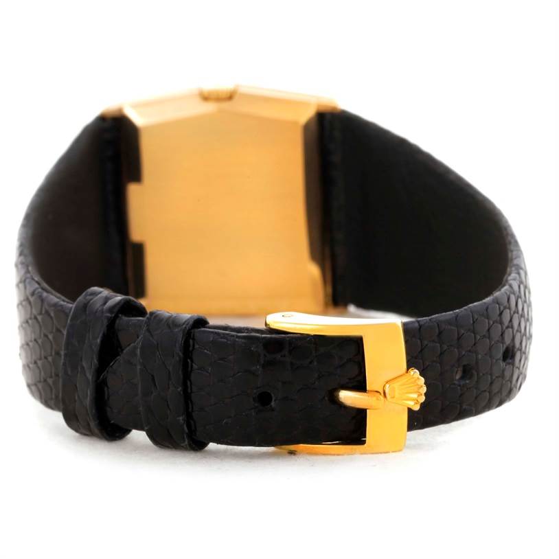 The image shows the back of a Rolex Cellini 4153 Men's Yellow Gold Black Dial 4153 Men's Yellow Gold Black Dial watch, highlighting the black leather strap and gold buckle.