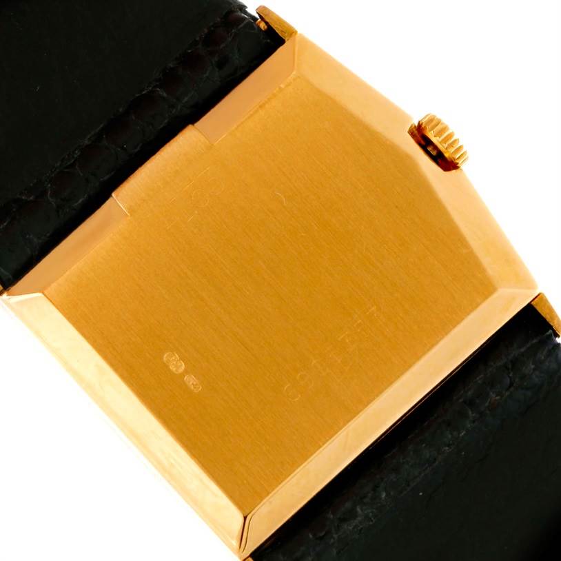 The image shows the back case and crown of a Rolex Cellini 4153 Men's Yellow Gold Black Dial 4153 Men's Yellow Gold Black Dial watch at a slight angle.