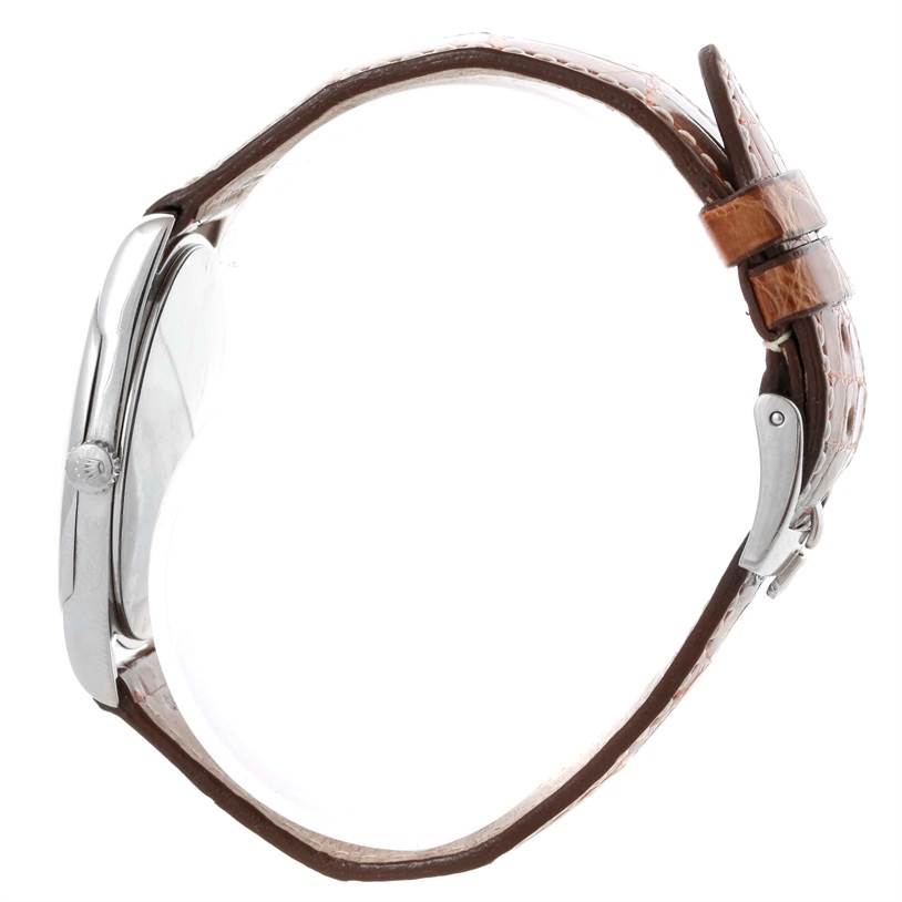 The image shows a side view of the Rolex Cellini 4233 Men's White Gold Black Dial 4233 Men's White Gold Black Dial watch, highlighting its case, crown, and brown leather strap with a clasp.