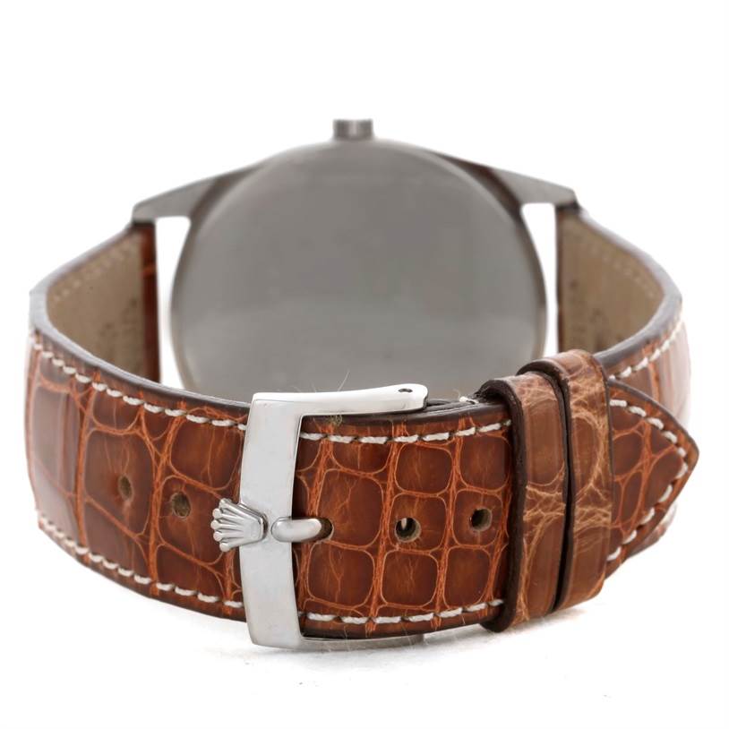 This image shows a rear angle of the Rolex Cellini 4233 Men's White Gold Black Dial 4233 Men's White Gold Black Dial watch, focusing on the brown leather strap and clasp.