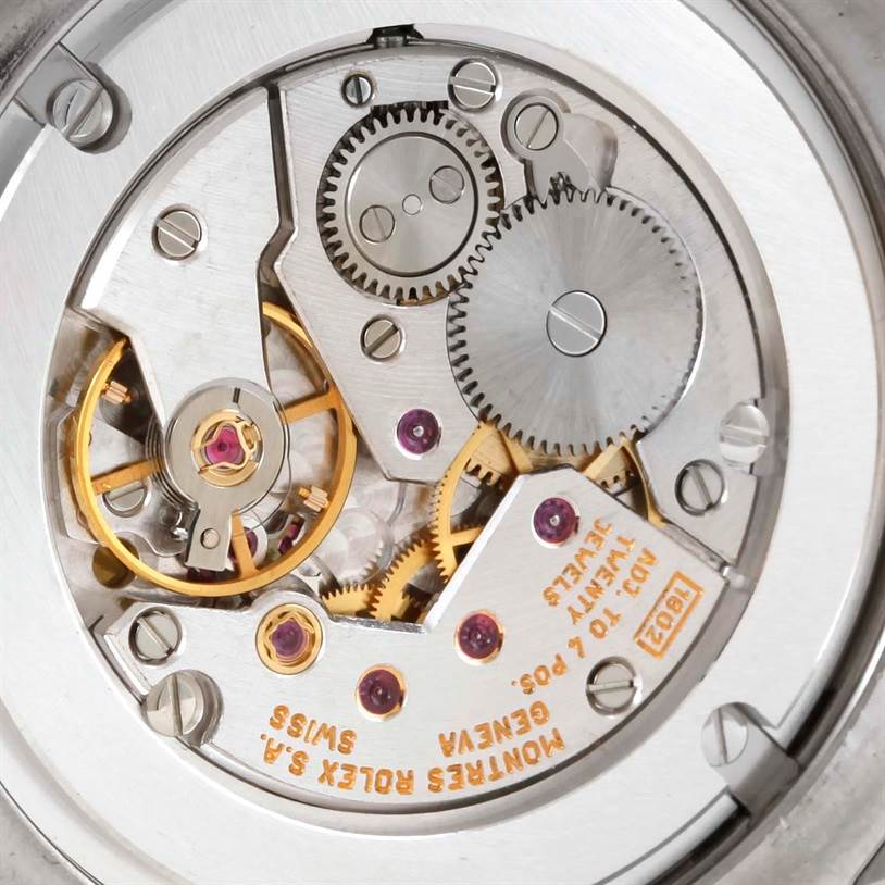 This image shows the internal mechanics of the Rolex Cellini 4233 Men's White Gold Black Dial 4233 Men's White Gold Black Dial watch, highlighting gears and movement components.