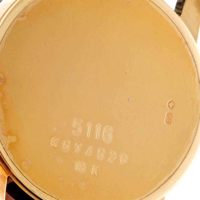 This image shows the back case of a Rolex Cellini 5116 Men's Yellow Gold Beige Dial 5116 Men's Yellow Gold Beige Dial watch, detailing the model number and its 18K gold composition.