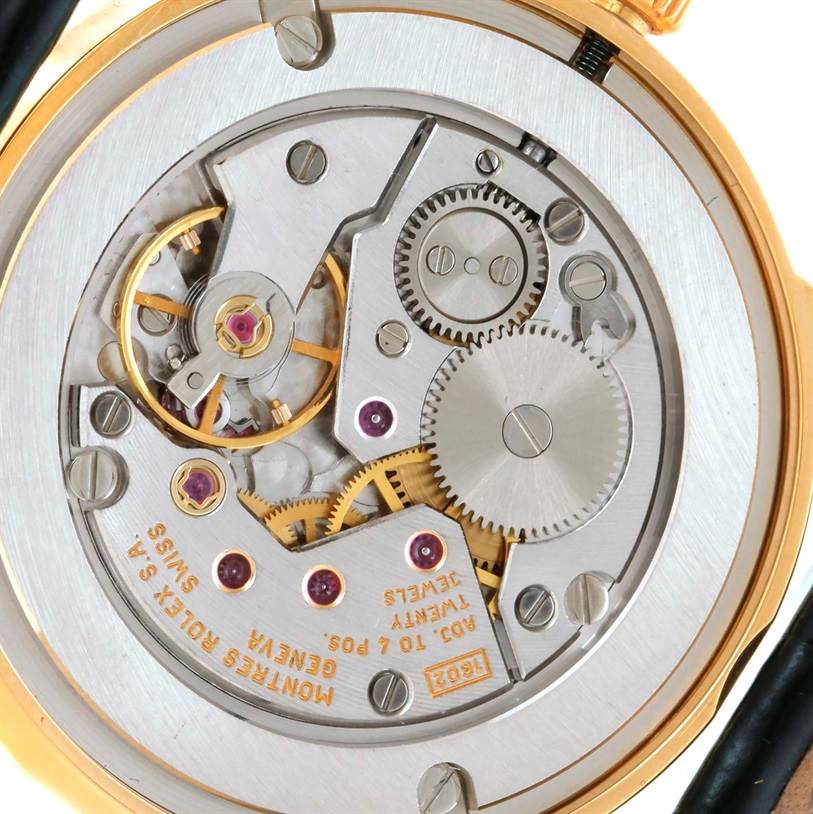 This image shows the movement and internal mechanics of a Rolex Cellini 5116 Men's Yellow Gold Beige Dial 5116 Men's Yellow Gold Beige Dial watch from the back.