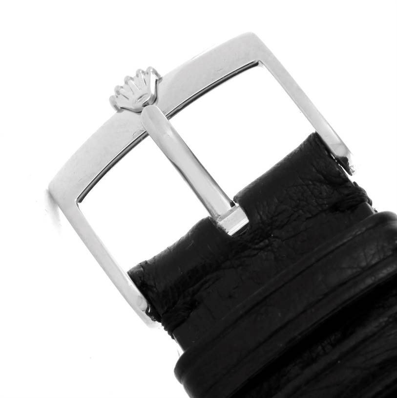 This image shows the buckle and part of the leather strap of a Rolex Cellini 5115 Men's White Gold Silver Dial 5115 Men's White Gold Silver Dial watch.