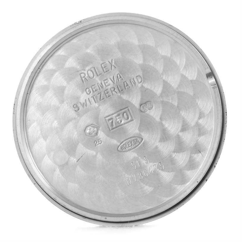 This image shows the inner side of the case back of a Rolex Cellini 5115 Men's White Gold Silver Dial 5115 Men's White Gold Silver Dial watch, displaying various engravings and markings.