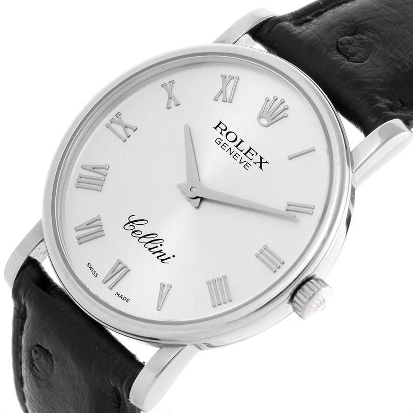 The image shows a Rolex Cellini 5115 Men's White Gold Silver Dial 5115 Men's White Gold Silver Dial watch at an angled view, focusing on the dial, crown, and part of the leather strap.