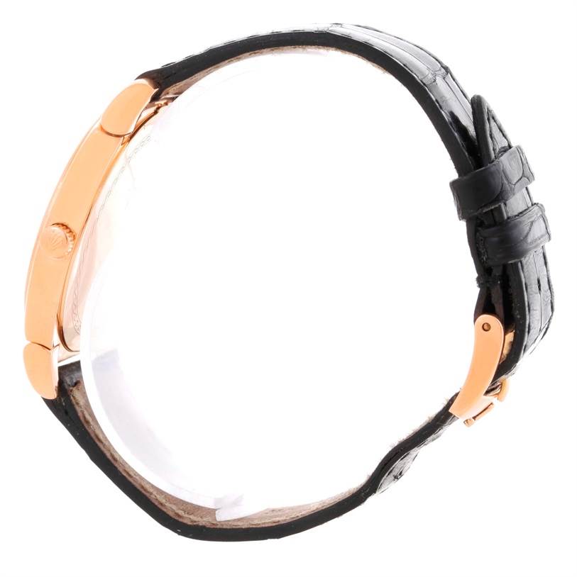 The image shows a side view of a Rolex Cellini 5330 Men's Rose Gold Grey Dial 5330 Men's Rose Gold Grey Dial watch, featuring its case, crown, and black leather strap.