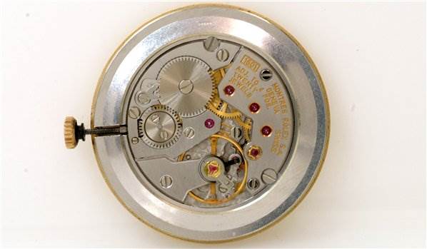 This image shows the internal mechanism of a Rolex Cellini 4112 Men's Yellow Gold Champagne Dial 4112 Men's Yellow Gold Champagne Dial watch from a top-down angle.