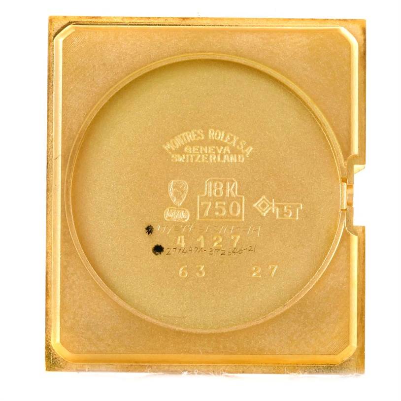 The image shows the interior case back of a Rolex Cellini 4127 Men
s Yellow Gold Champagne Dial 4127 Men
s Yellow Gold Champagne Dial watch made of 18k gold.