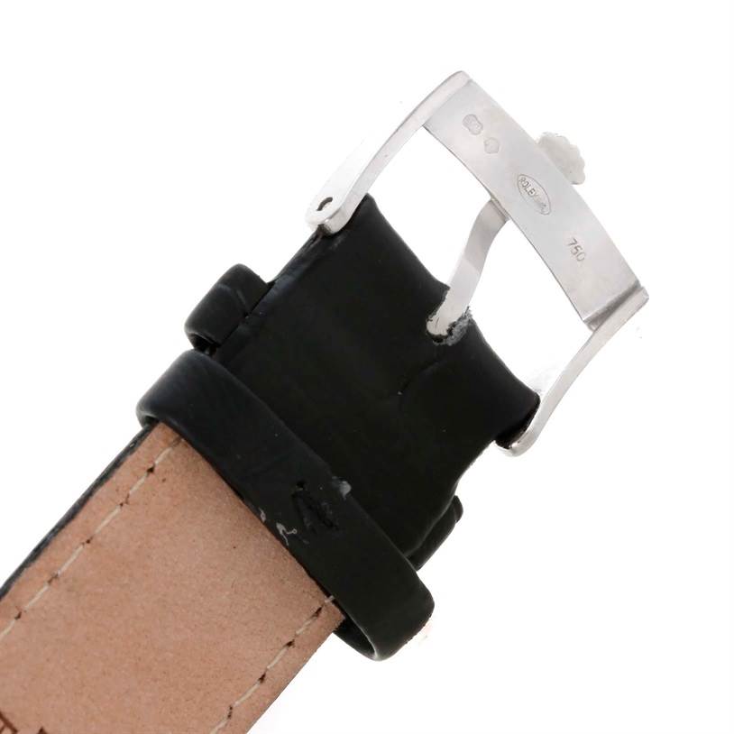 The image shows a close-up view of the buckle and strap of a Rolex Cellini 4233 Men's White Gold White Dial 4233 Men's White Gold White Dial watch.