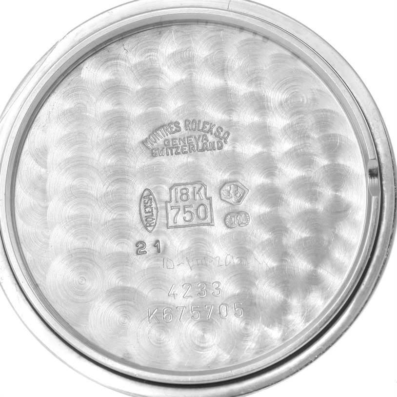 This is the interior case back of a Rolex Cellini 4233 Men's White Gold White Dial 4233 Men's White Gold White Dial watch, showing various engravings and hallmarks.