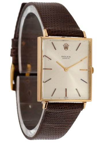 This image shows a Rolex Cellini 3607 Men's Yellow Gold Silver Dial 3607 Men's Yellow Gold Silver Dial watch at a three-quarter angle, featuring its rectangular face and leather strap.