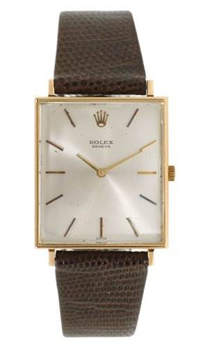 This image shows a front view of the Rolex Cellini 3607 Men's Yellow Gold Silver Dial 3607 Men's Yellow Gold Silver Dial watch, highlighting its square face, leather strap, and gold-tone casing.