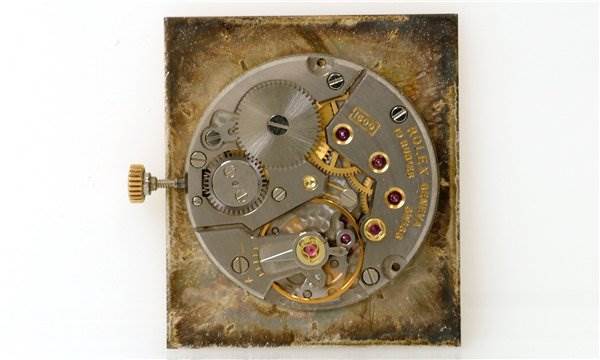 The image shows the internal mechanism of a Rolex Cellini 3607 Men's Yellow Gold Silver Dial 3607 Men's Yellow Gold Silver Dial watch, viewed from the back.