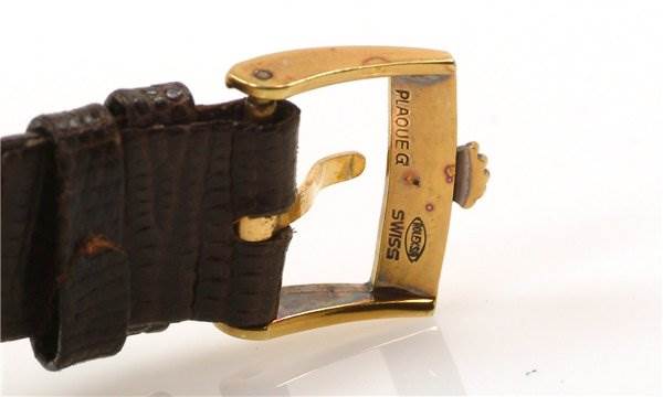 The image shows a close-up of the buckle and leather strap of a Rolex Cellini 3607 Men's Yellow Gold Silver Dial 3607 Men's Yellow Gold Silver Dial watch, highlighting the gold finish and clasp.