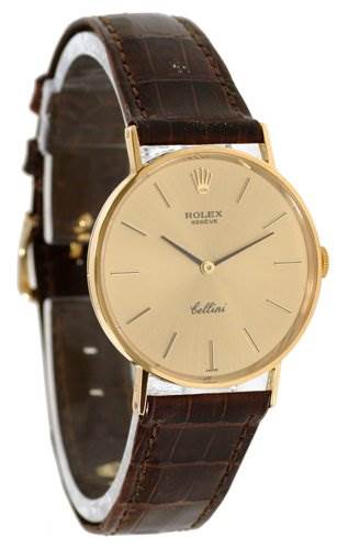 The image shows a Rolex Cellini 3833 Men's Yellow Gold Champagne Dial 3833 Men's Yellow Gold Champagne Dial watch from a 3/4 angle, displaying the face, gold case, and brown leather strap.