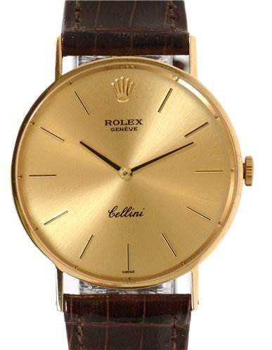 The image shows a front view of a Rolex Cellini 3833 Men's Yellow Gold Champagne Dial 3833 Men's Yellow Gold Champagne Dial watch, highlighting its gold dial, hands, crown, and brown leather strap.