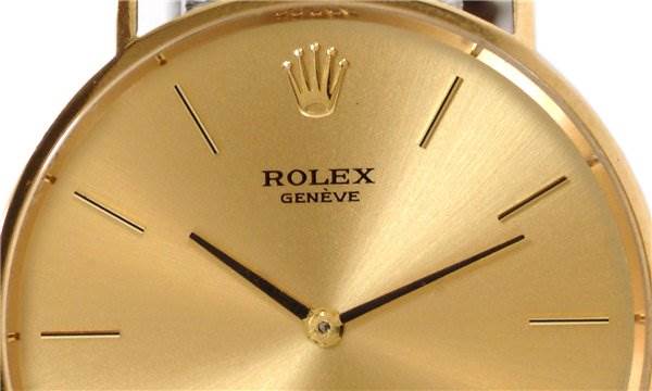 This image shows the face of a Rolex Cellini 3833 Men's Yellow Gold Champagne Dial 3833 Men's Yellow Gold Champagne Dial watch, displaying the dial, hands, markers, and logo.