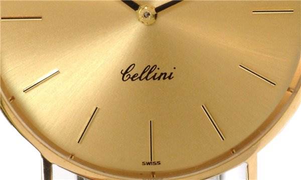 The image shows a close-up of the dial's lower half of a Rolex Cellini 3833 Men's Yellow Gold Champagne Dial 3833 Men's Yellow Gold Champagne Dial watch, highlighting its gold face, minute markers, and brand labeling.