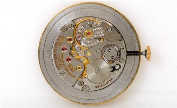 This image shows the intricate internal mechanical components of a Rolex Cellini 3833 Men's Yellow Gold Champagne Dial 3833 Men's Yellow Gold Champagne Dial model watch from a top-down angle.