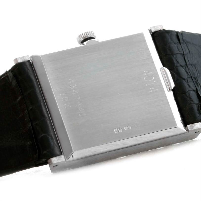 The image shows the back case of a Rolex Cellini 4014 Men's White Gold Blue Dial 4014 Men's White Gold Blue Dial watch, displaying the serial number, material designation, and part of the leather strap.