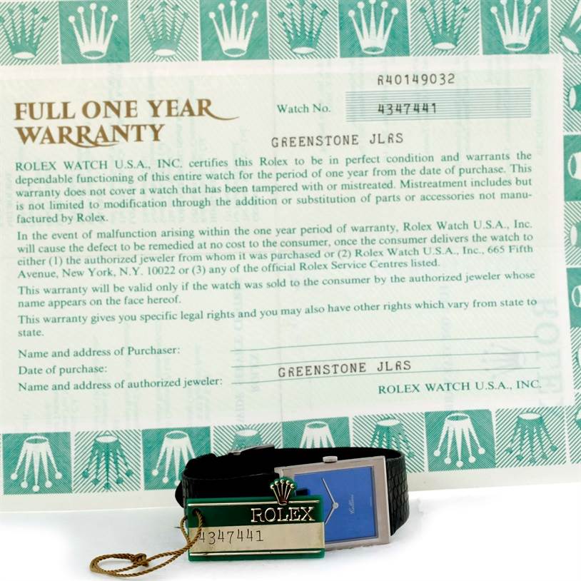The image shows the warranty card and hang tag for a Rolex Cellini 4014 Men's White Gold Blue Dial 4014 Men's White Gold Blue Dial watch, with a partial view of the watch face and strap.