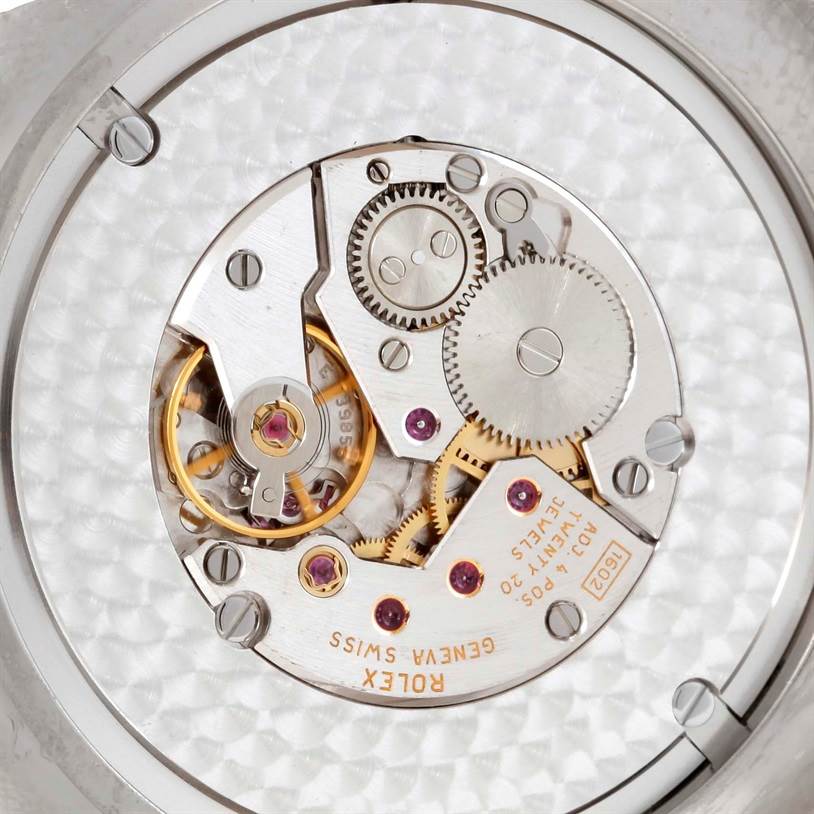 This image shows the intricate movement and internal mechanism of a Rolex Cellini 4243 Men's White Gold Silver Dial 4243 Men's White Gold Silver Dial watch.