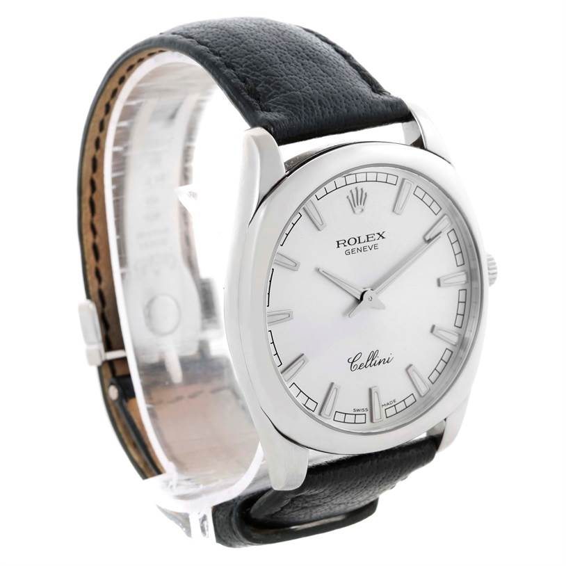 The image shows a Rolex Cellini 4243 Men's White Gold Silver Dial 4243 Men's White Gold Silver Dial model watch in a 3/4 angle, showcasing its dial, case, and leather strap.