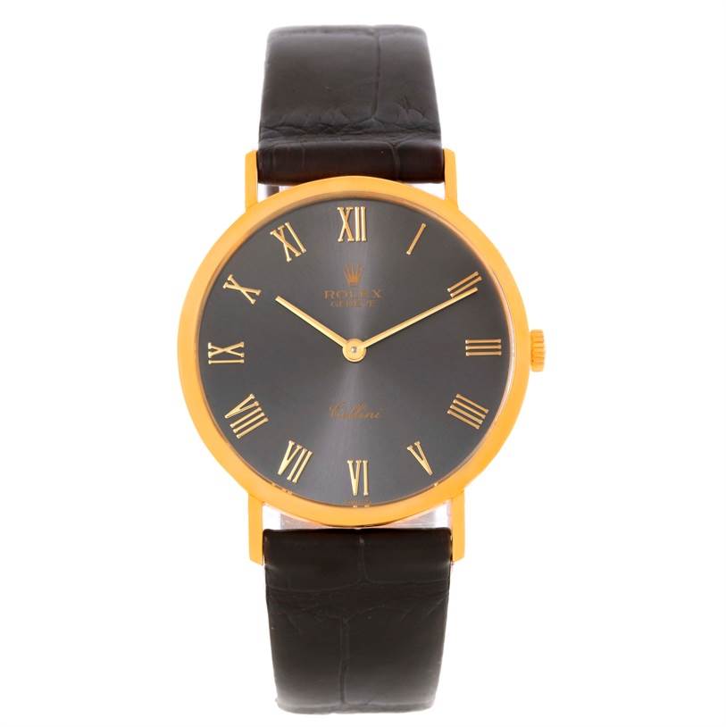 This image shows a front view of a Rolex Cellini 4112 Men
s Yellow Gold Grey Dial 4112 Men
s Yellow Gold Grey Dial watch, highlighting its black leather strap, golden case, and black dial with Roman numerals.