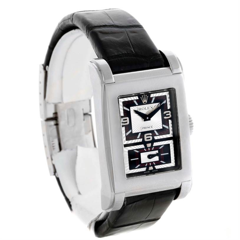 The Rolex Cellini 5443 Men's White Gold Black Dial 5443 Men's White Gold Black Dial watch is shown from a front angle, highlighting its rectangular face, black leather strap, and silver case.