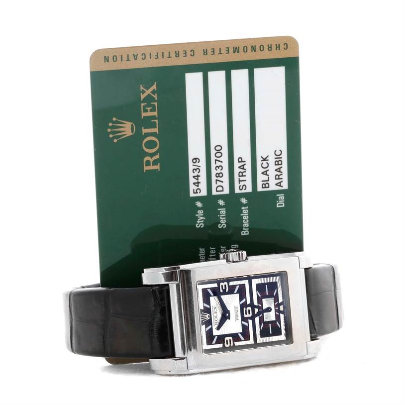 The image shows a Rolex Cellini 5443 Men's White Gold Black Dial 5443 Men's White Gold Black Dial watch with a black strap, next to its certification card.
