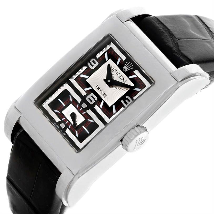 The image shows a close-up, angled view of a Rolex Cellini 5443 Men's White Gold Black Dial 5443 Men's White Gold Black Dial watch, highlighting its rectangular dial and leather strap.