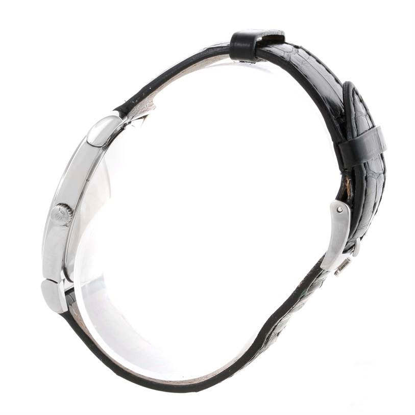 The image shows a Rolex Cellini 5330 Men's White Gold Mother of Pearl Dial 5330 Men's White Gold Mother of Pearl Dial watch from a side view, highlighting the case, crown, and leather strap.