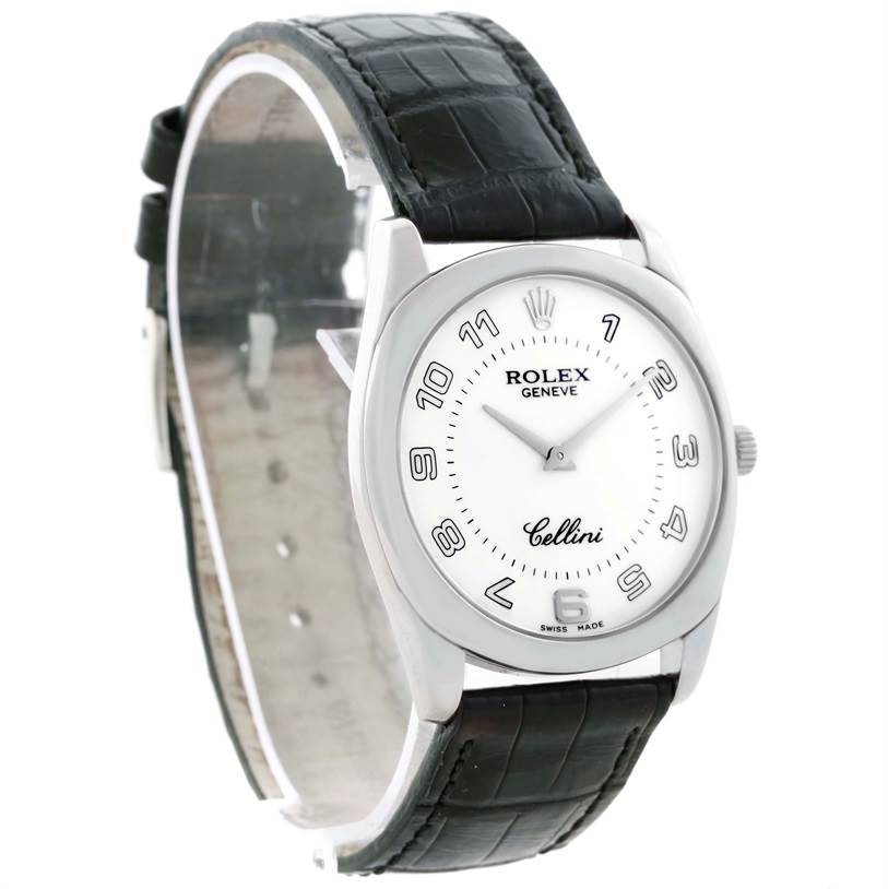 The image shows a Rolex Cellini 4233 Men
s White Gold White Dial 4233 Men
s White Gold White Dial watch at a slight angle, featuring its white dial, black leather strap, and stainless steel case.