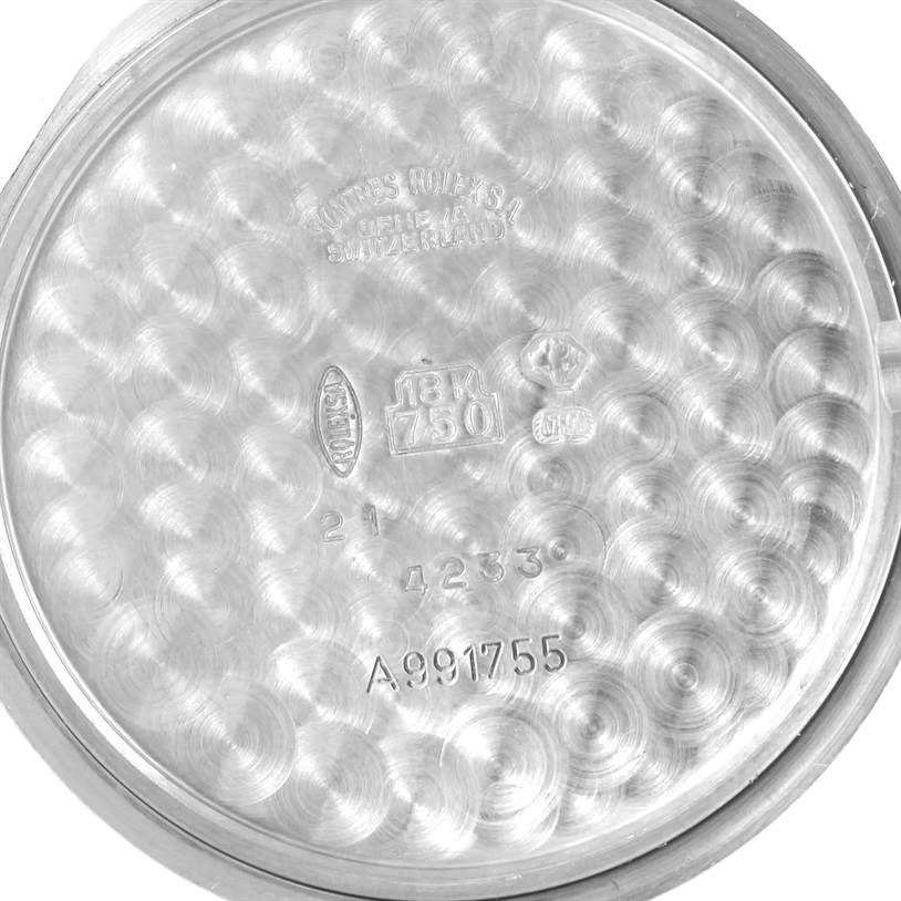 This is an inside view of the case back of a Rolex Cellini 4233 Men
s White Gold White Dial 4233 Men
s White Gold White Dial watch, displaying hallmark and model engravings.